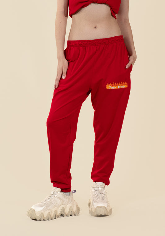 Pants deportivos con bordado flamas en french terry